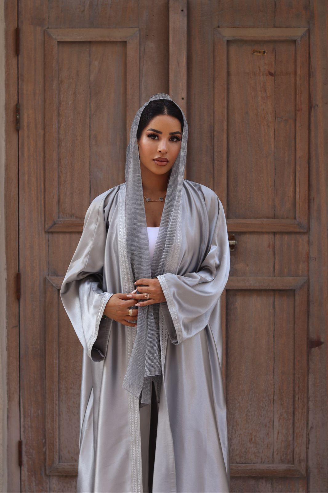 silver abaya dress Silver abaya Shimmer silver abaya with baloon sleeves and belt detailing Abayas from Cucire at Boksha